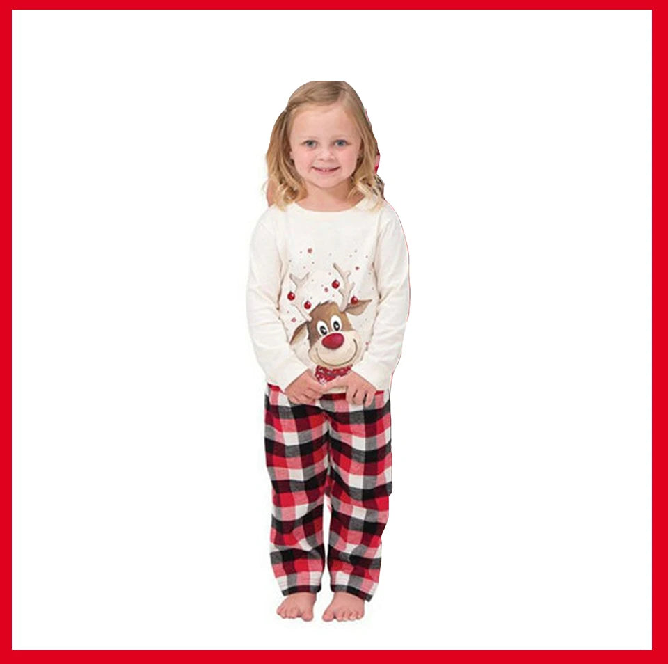 SnugglePJs folded Christmas sleepwear set for kids