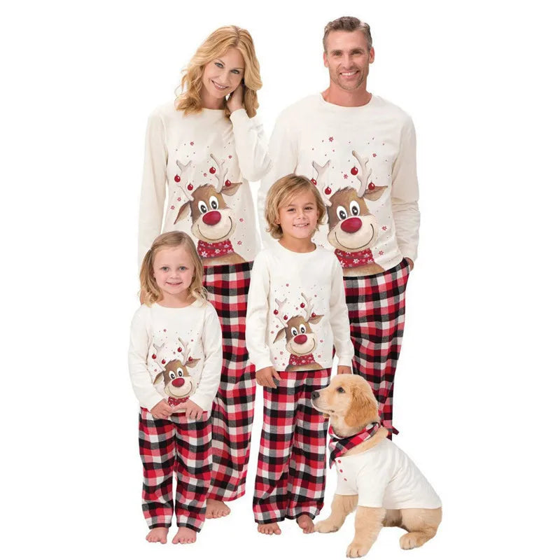 Matching Christmas pyjamas set by SnugglePJs – family wearing xmas pjs